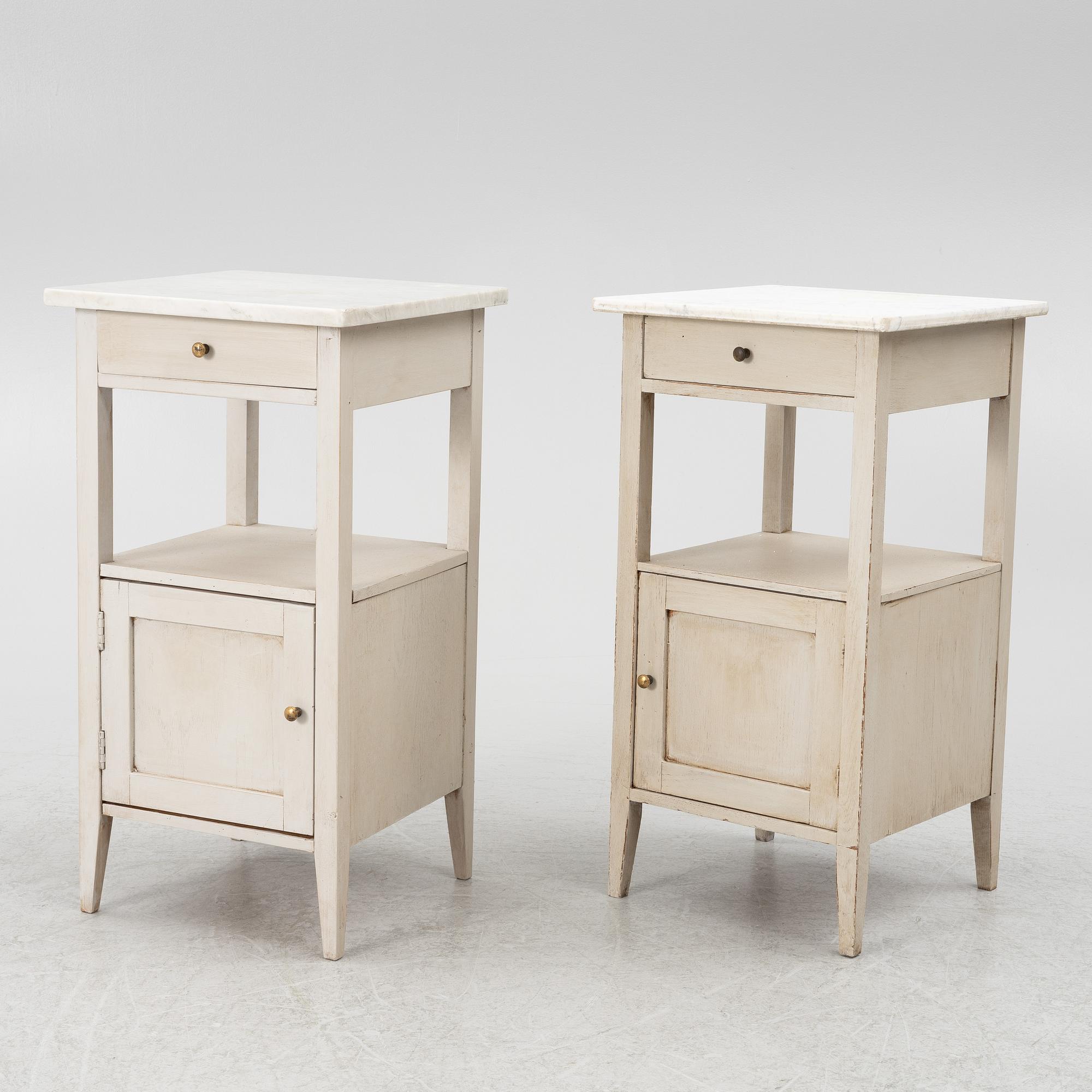 A matched pair of bedside tables.