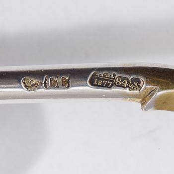 A Russian 19th century parcel-gilt caviar-spoon, marks of S. Stroganov, Moscow 1877.