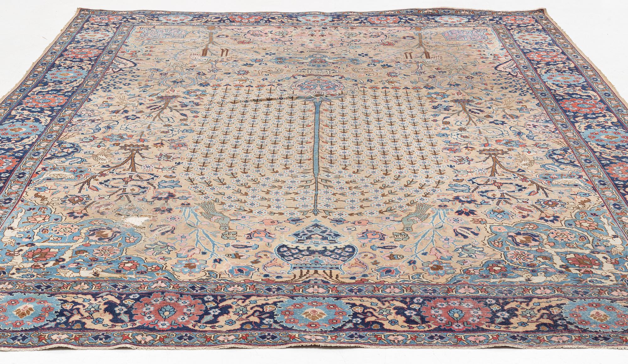 An oriental carpet, circa 350 x 295 cm.
