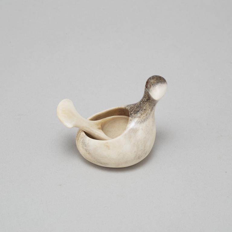 LARS PIRAK, a reindeer horn salt cellar and spoon, signed Lars Pirak Jokkmokk.