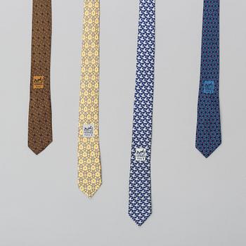 A set of four silk ties by Hermès.