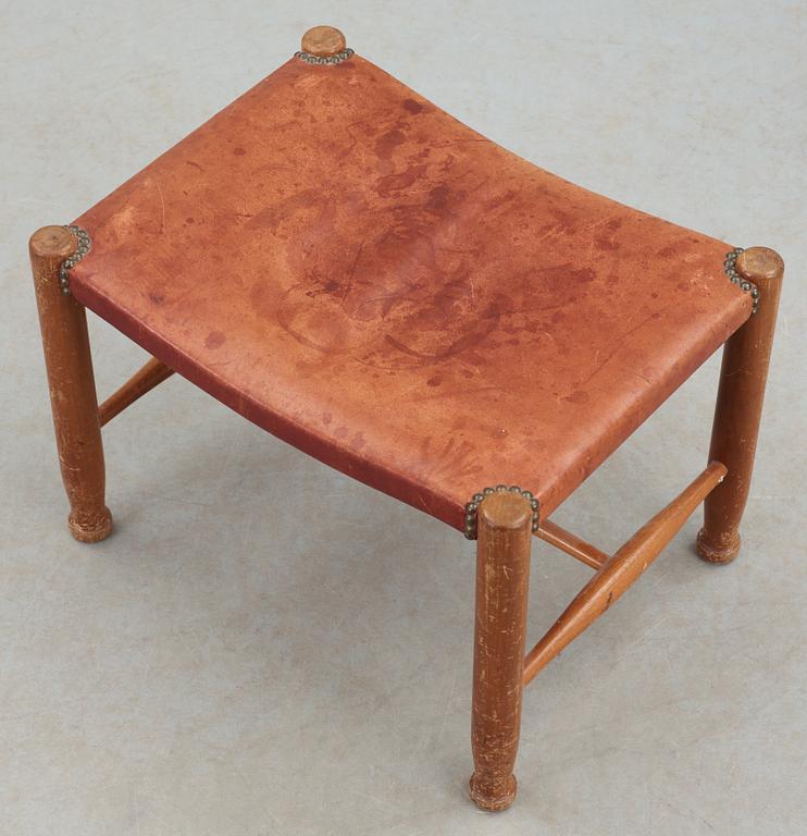 A Josef Frank mahogany and red leather stool, Svenskt Tenn, model 686.