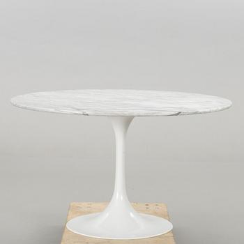 A 1980's MARBLE TOP TABLE.