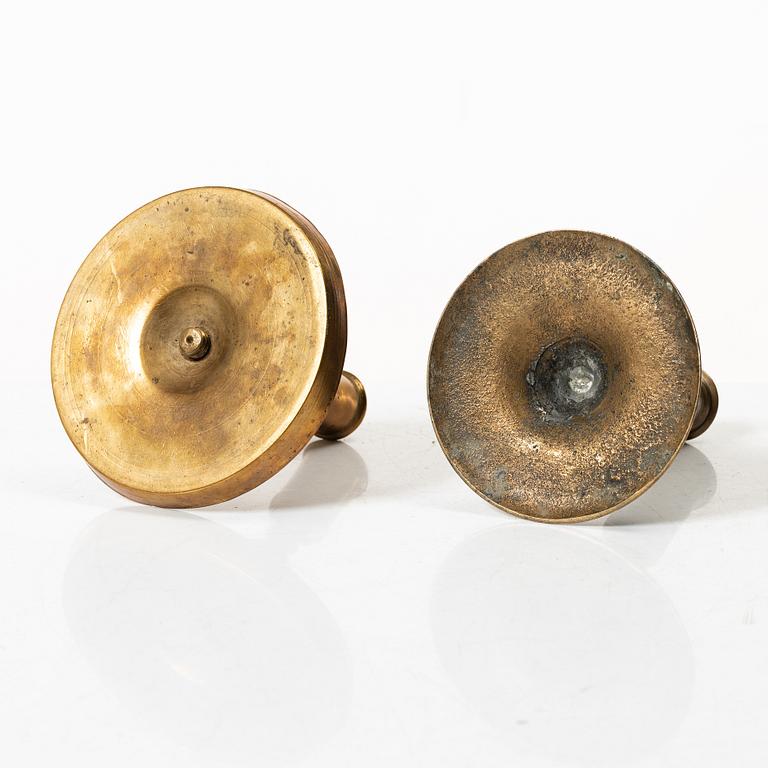 Candelabra, 4 pcs, and a chamberstick for two candles, brass, 19th century.