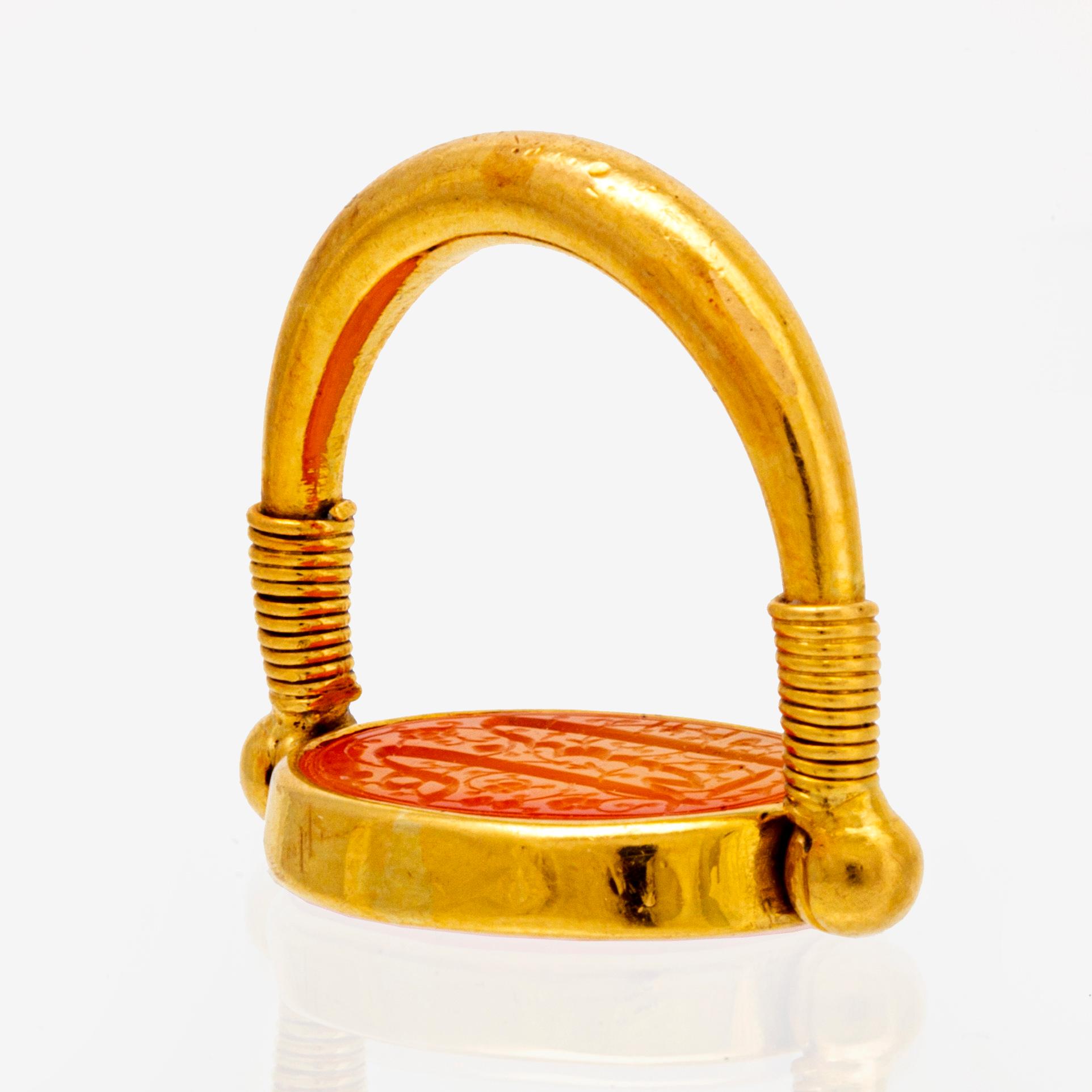 Ring and pendant, 18k and 14K (pendant), carnelian inscribed.