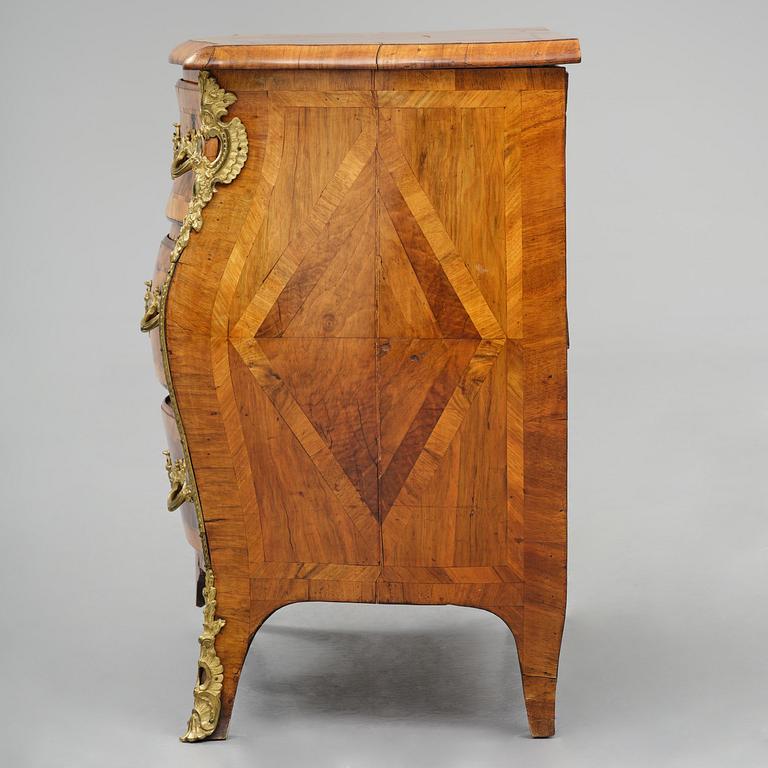 A Swedish rococo parquetry and gilt brass-mounted commode, Stockholm, later part 18th century.