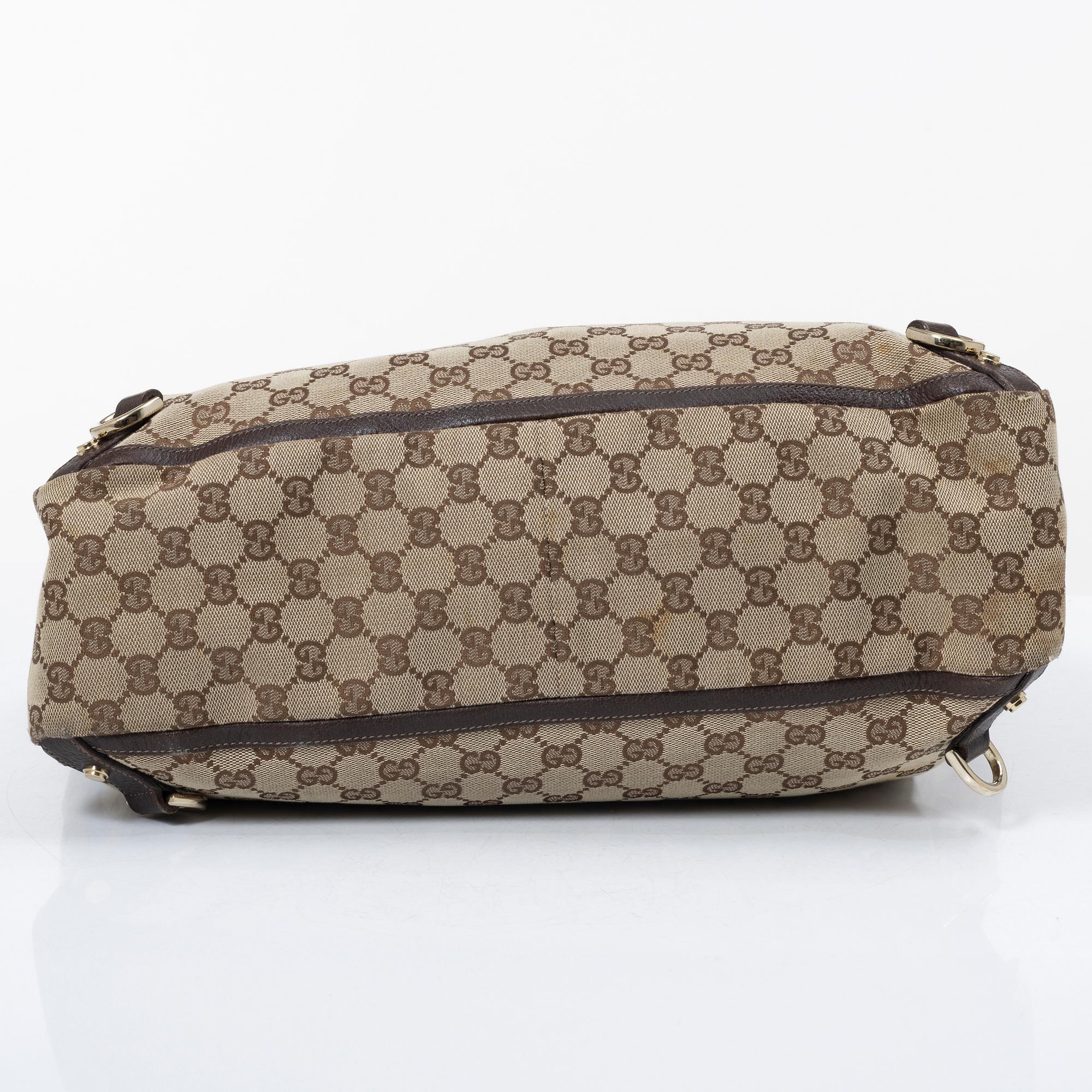 Gucci, a canvas and leather bag.