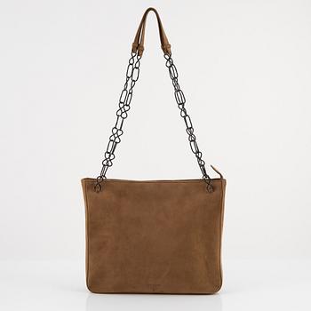 Prada, a tan suede bag.