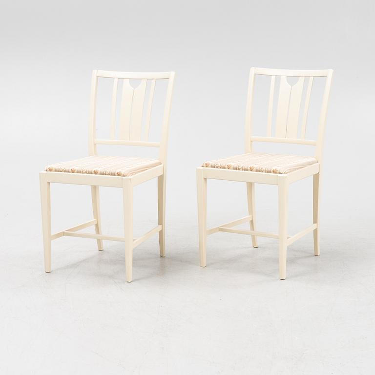 Carl Malmsten, a 'Herrgården' dining table and four 'Ulfåsa' chairs, second half of the 20th Century.