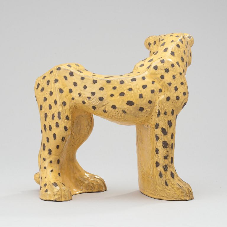 A Vicke Lindstrand yellow glazed ceramic figure of a leopard, Upsala-Ekeby.