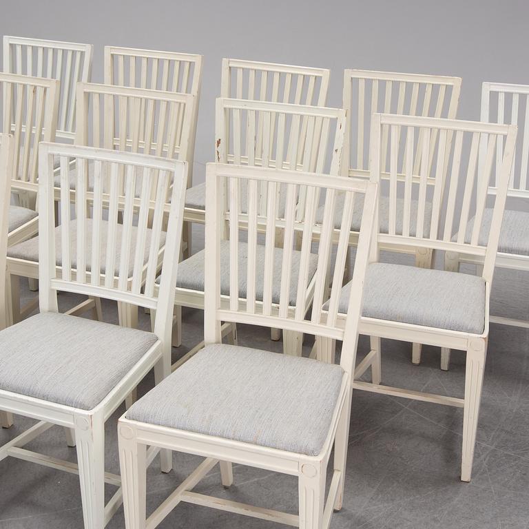 A set of 12 gustavian style chairs from the second half of the 20th century.