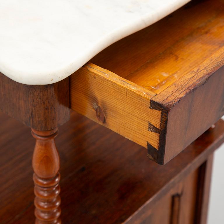 An early 20th century bedside table.