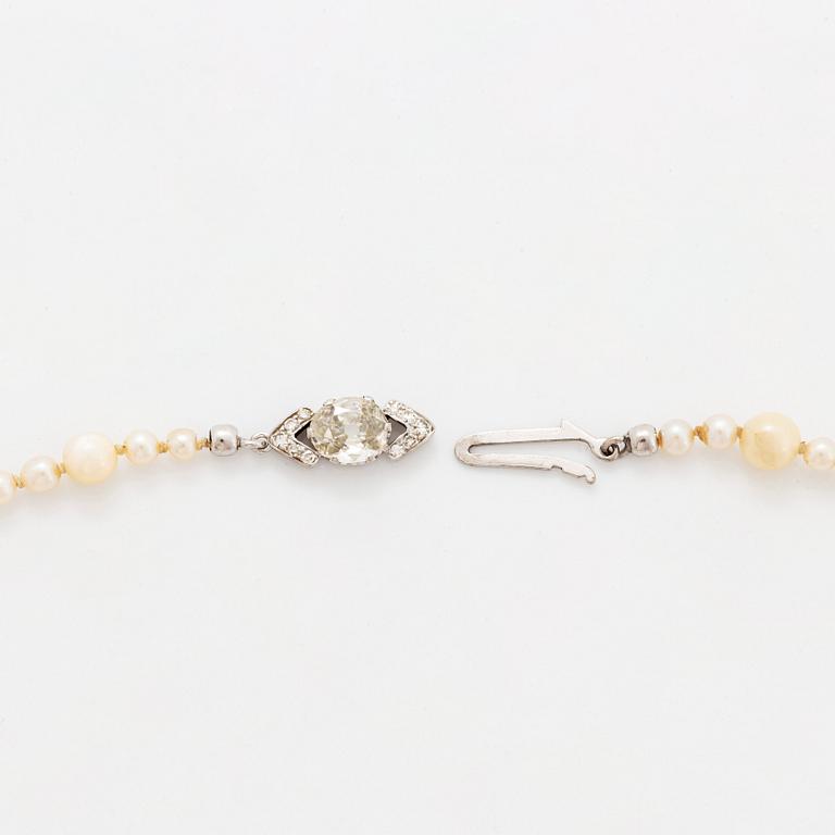 A cultured pearl necklace with a WA Bolin clasp.