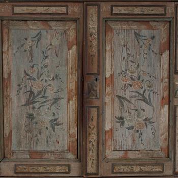 a painted cabinet, partly 18th century.