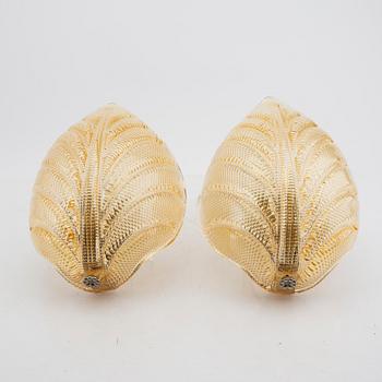 A pair of Possibly Orrefors glass wall scones mid 1900s.