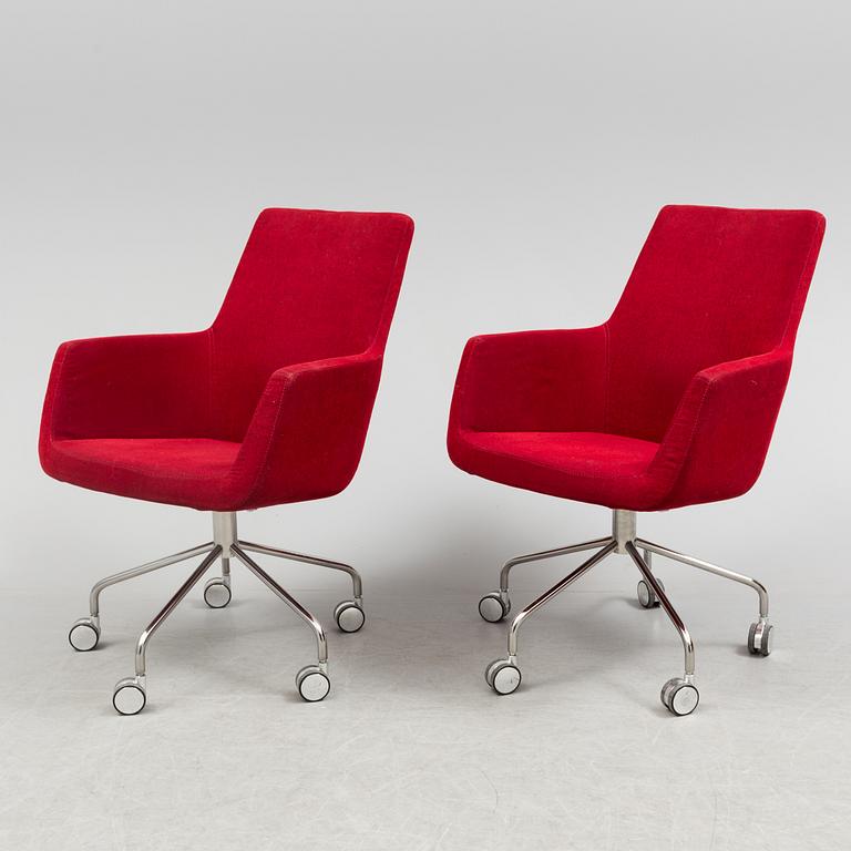 A pair of "Happy" armchairs by Roger Persson, Swedese.