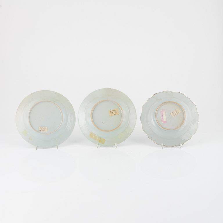 A set of six odd famille rose plates and a small dish, Qing dynasty, Qianlong (1736-95).