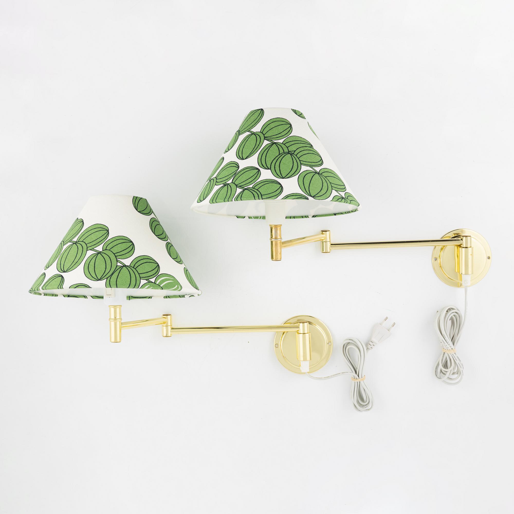 A pair of brass wall lights, later part of the 20th Century.