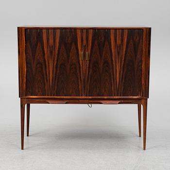 KURT ØSTERVIG, a rosewood veneered drinks cabinet, Denmerk, 1960's.