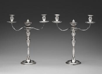 A pair of English 18th century silver candelabras, marks of Henry Hobdell, London 1778.