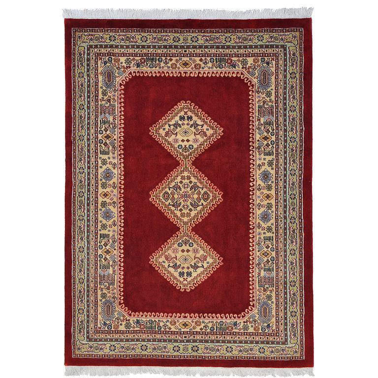 A Persian Rug, approximately 240 x 165 cm.