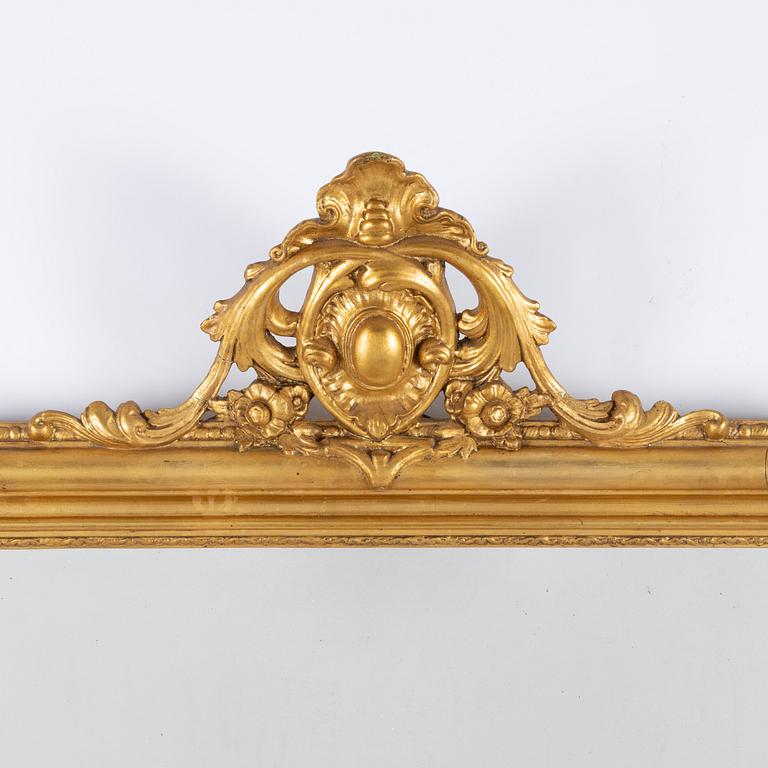 A gesso rococo-revival mirror, later part of the 20th Century.