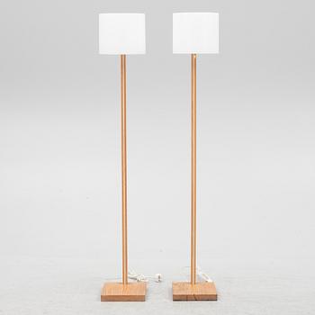 Uno & Östen Kristiansson, a pair of floor lamps, Luxus, second half of the 20th Century.