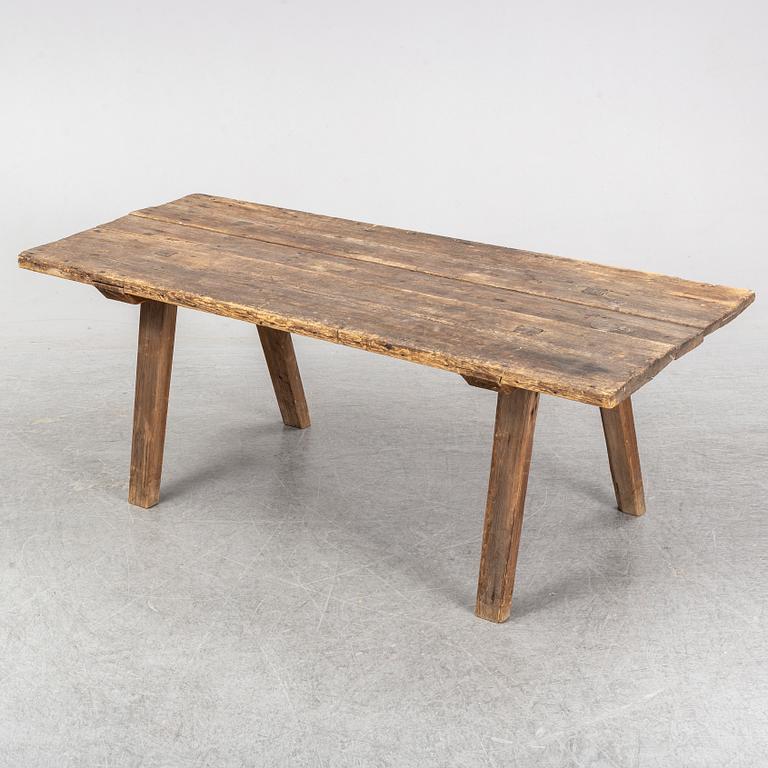 A pine table, 19th Century.