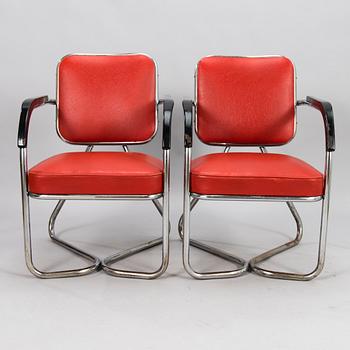 Two 1930/1940's armchairs / hairdressing chairs.