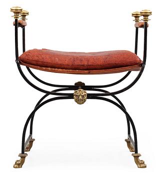 541. A Swedish iron and brass stool, 1920-30's,