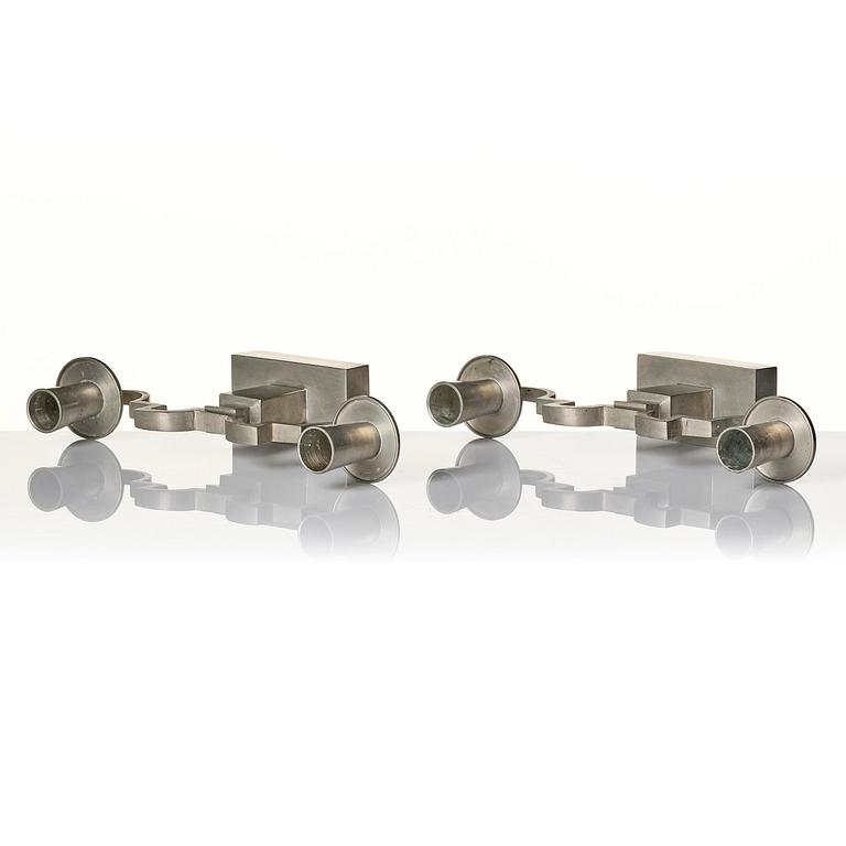 Nils Fougstedt, a pair of pewter candelabra model "A 1047", Firma Svenskt Tenn, Stockholm 1932.