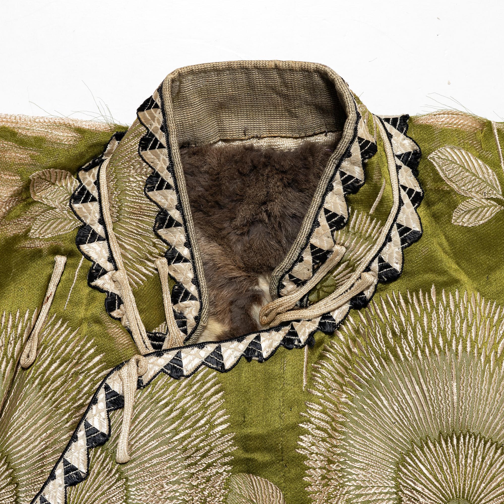A Japanese silk brocade and fur childrens jacket, Meiji (1868-1912).