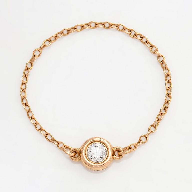 Tiffany & Co, Elsa Peretti, an 18K gold 'Diamonds by The Yard' ring with a brilliant-cut diamond.