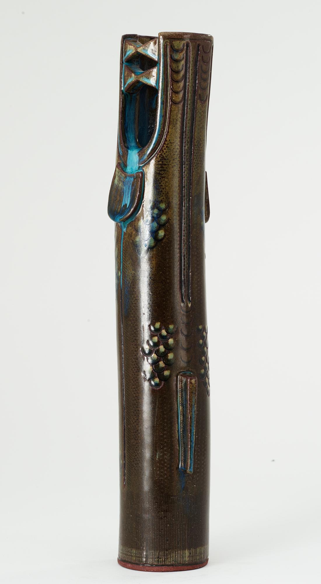 A Wilhelm Kåge 'Farsta' stoneware vase in the shape of a 'dragon fish', Gustavsberg studio 1955.