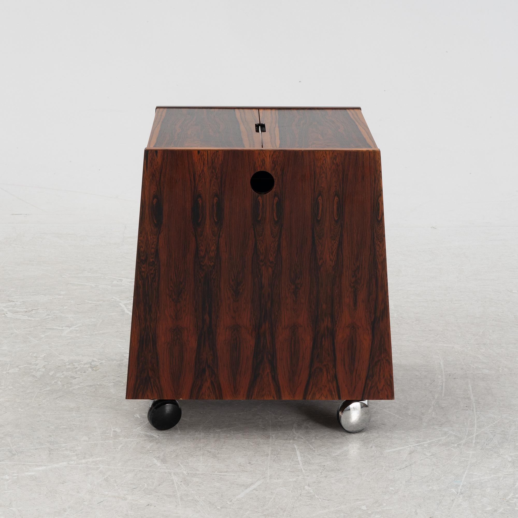 Rolf Hesland, a rosewood-veneered magazine rack/minibar from Bruksbo, Norway, 1960's.