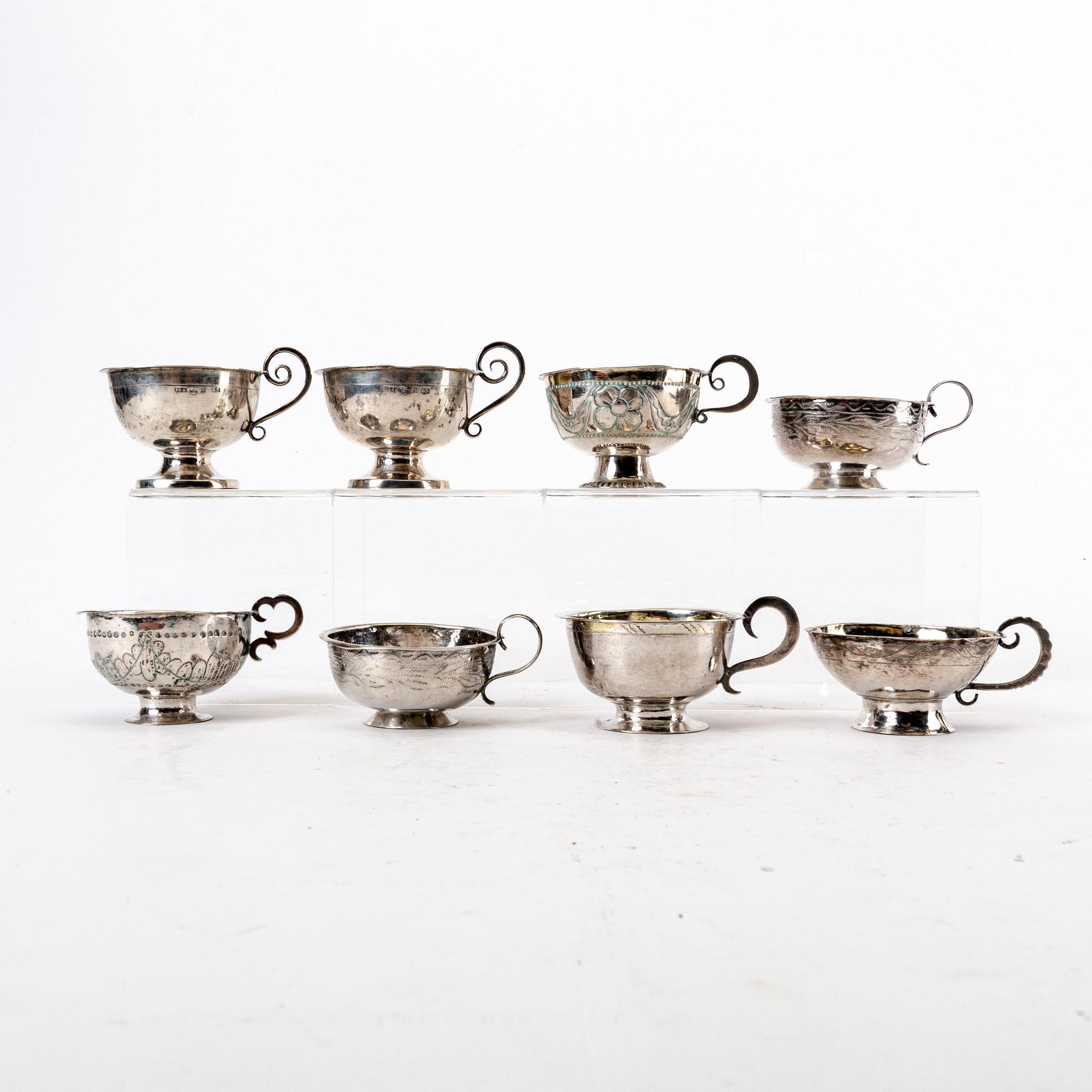 A Swedish 19th century set of eight silver cups, weight 168 grams.