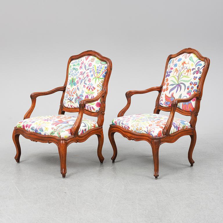 Two 18th century French Louis XV walnut armchairs.