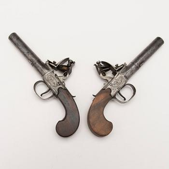 A pair of english boxlock flintock pistols marked E. Bond London, circa 1800.