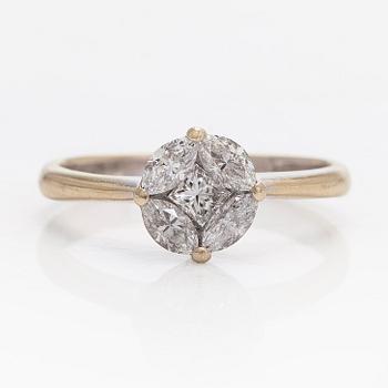 Sormus, markiisihiottuja ja prinsessihiottuja timantteja, 18K valkokultaa.