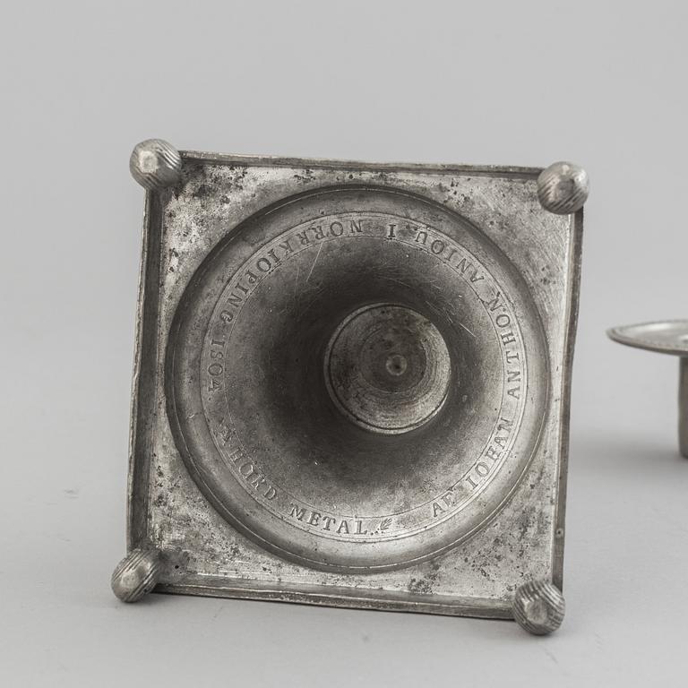 A pair of pewter candle stick by Anjou, Norrköping 1804.