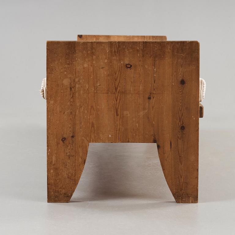 A stained pine daybed possibly by Axel Einar Hjorth, Nordiska Kompaniet, Sweden ca 1930.