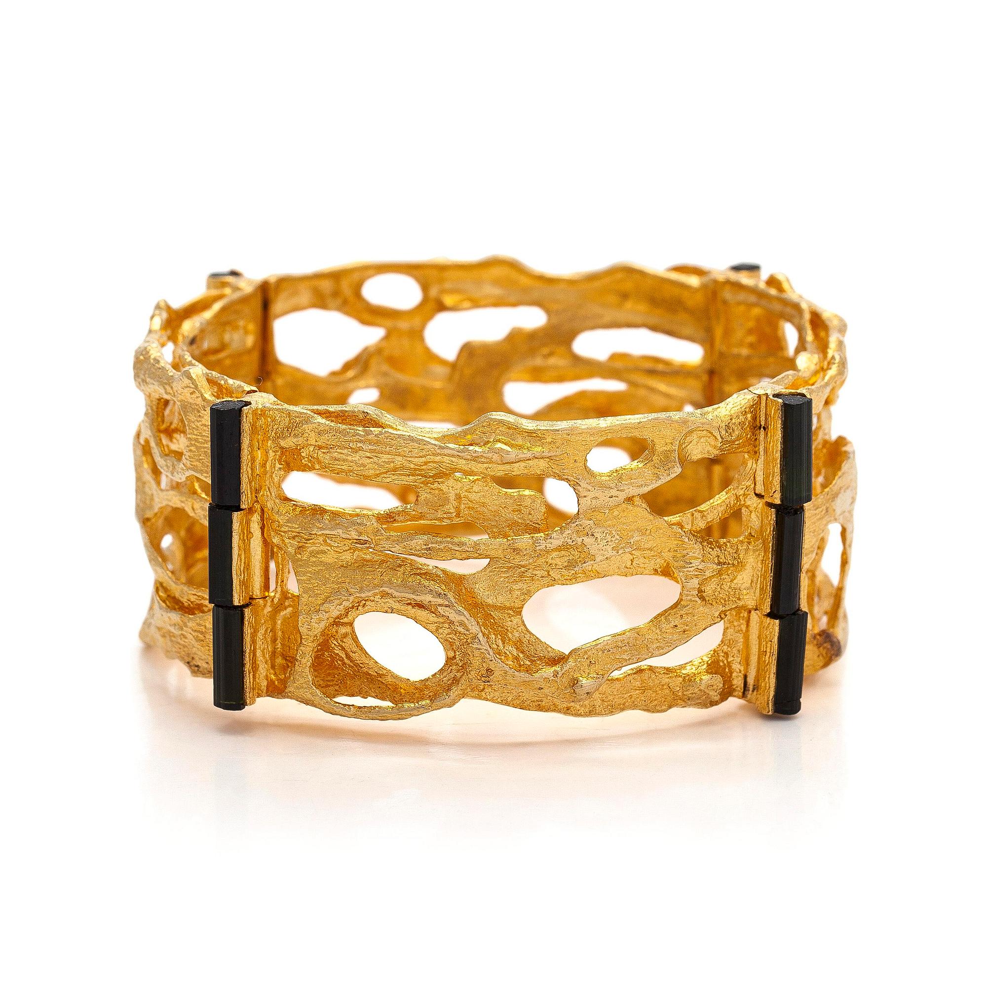 Björn Weckström, an 18K gold and tourmaline 'Sacrificial fire' bracelet. Lapponia 1971.