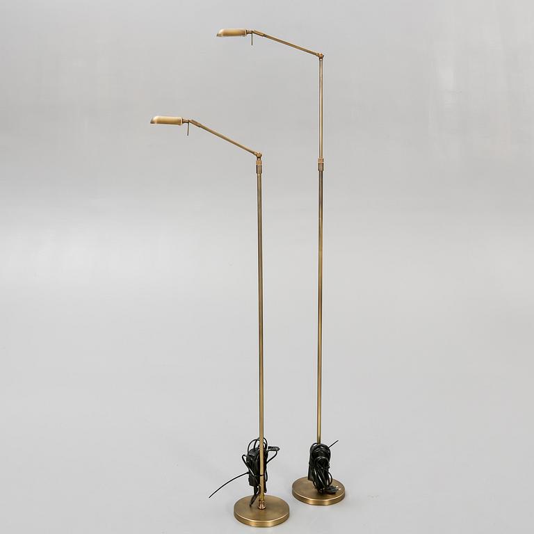 A pair of brass floor lamps 21 st century.