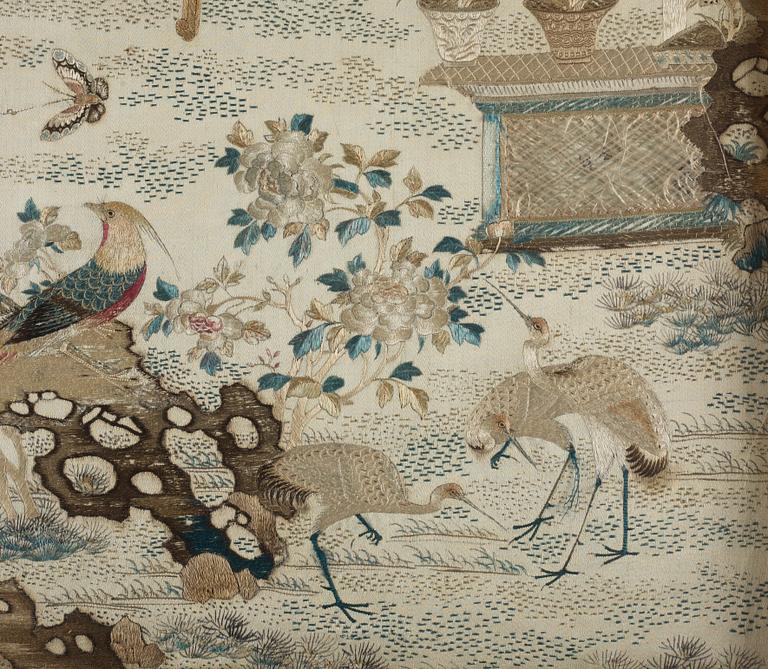 A silk embroidery with a scene from court life, Qing dynasty (1662-1912).