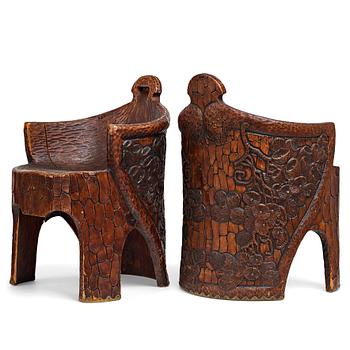 233. Gustaf Fjaestad, a pair of Art Nouveau carved pine chairs "stabbestolar", Arvika Sweden 1908-1909.