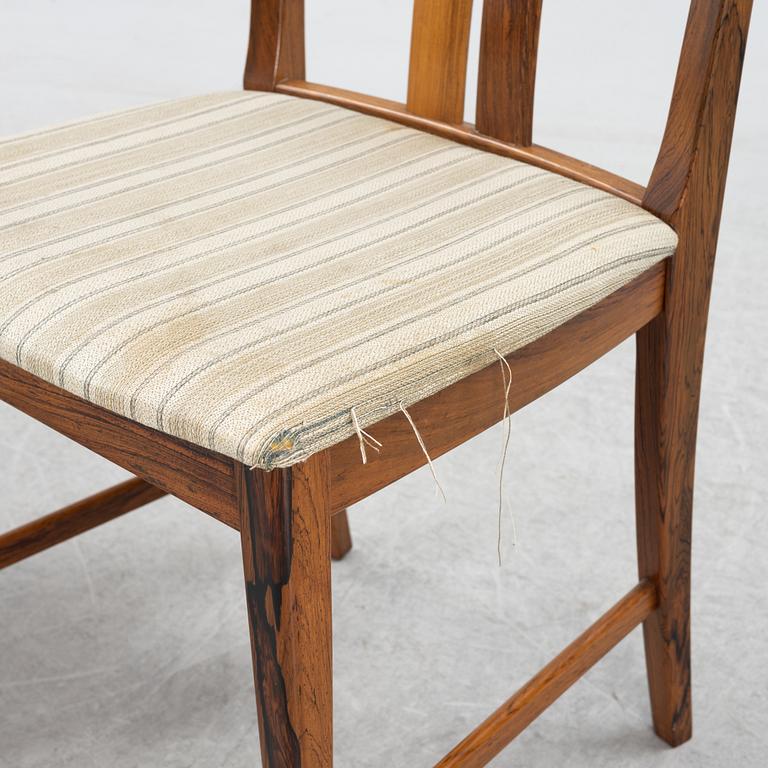 A 1960's/70's rosewood veneered dining group.
