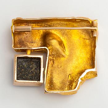 Björn Weckström, a 14K gold brooch with copper ore. Lapponia 1967.
