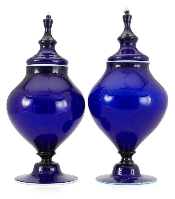 Two blue glass jars with covers, Gothenburg glass manufactory, ca 1800. (2).