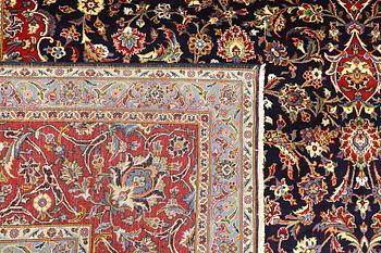 A Keshan carpet, approx. 397 x 307 cm.