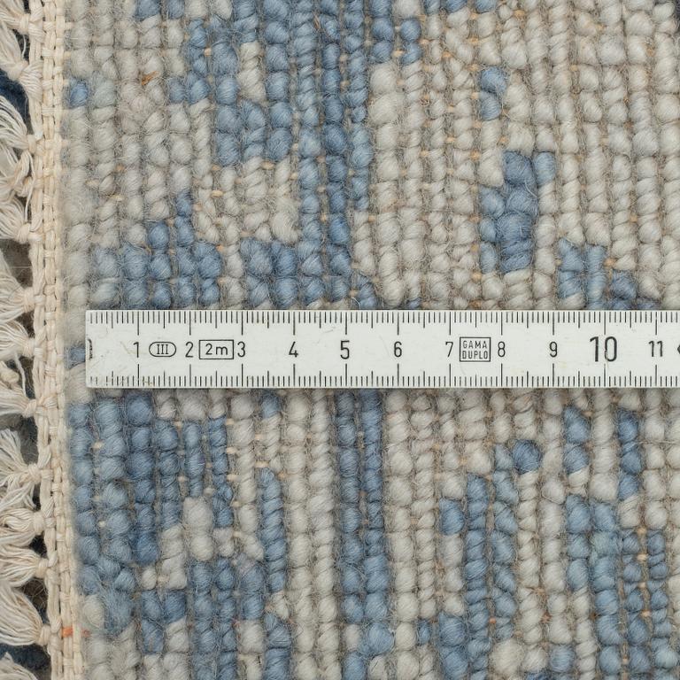 A carpet, oriental, ca 305 x 246 cm.